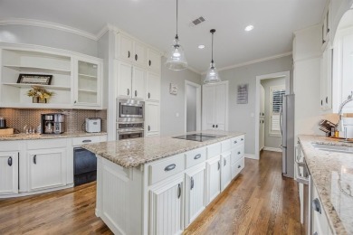 Beautifully maintained home located in the guard-gated community on Hackberry Creek Country Club in Texas - for sale on GolfHomes.com, golf home, golf lot