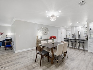 Enjoy golf course views from your spacious lanai! This inviting on Myerlee Country Club in Florida - for sale on GolfHomes.com, golf home, golf lot