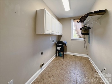 This beautiful custom home is located in the desirable Larkin on Fox Den Country Club in North Carolina - for sale on GolfHomes.com, golf home, golf lot