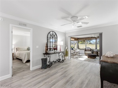 Enjoy golf course views from your spacious lanai! This inviting on Myerlee Country Club in Florida - for sale on GolfHomes.com, golf home, golf lot