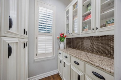 Beautifully maintained home located in the guard-gated community on Hackberry Creek Country Club in Texas - for sale on GolfHomes.com, golf home, golf lot