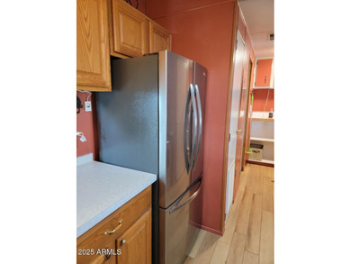 This is a lovely 2 bedroom 2 bath partially furnished home on 3 Parks Fairways in Arizona - for sale on GolfHomes.com, golf home, golf lot