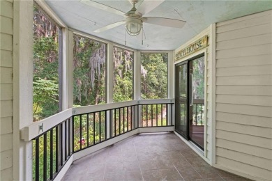 Tucked beneath a canopy of majestic oak trees in a peaceful on Sea Palms Golf and Tennis Resort in Georgia - for sale on GolfHomes.com, golf home, golf lot