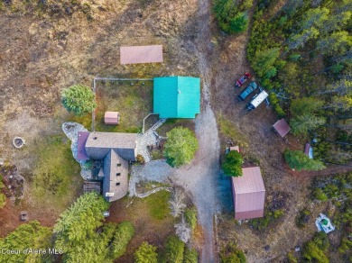 Bring all your outdoor toys to this great property with Main on Priest Lake Golf and Tennis Club in Idaho - for sale on GolfHomes.com, golf home, golf lot