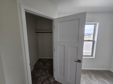 Brand new construction. Located in Hidden Bridge Ranch across on Hidden Bridge Golf Club in Wyoming - for sale on GolfHomes.com, golf home, golf lot