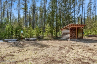 Bring all your outdoor toys to this great property with Main on Priest Lake Golf and Tennis Club in Idaho - for sale on GolfHomes.com, golf home, golf lot