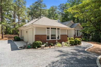 Ownership pride shows in this beautiful home within the Guarded on Pinewild Country Club of Pinehurst in North Carolina - for sale on GolfHomes.com, golf home, golf lot