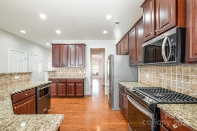 This well-maintained 4 bedroom, 3 1/2 bath end unit townhome in on Skybrook Golf Club in North Carolina - for sale on GolfHomes.com, golf home, golf lot