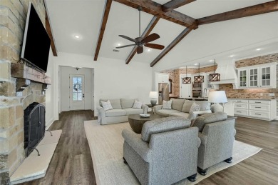 This stunning 4-bedroom, 3.5-bath home with guest suite and on Lake Kiowa Golf Course in Texas - for sale on GolfHomes.com, golf home, golf lot