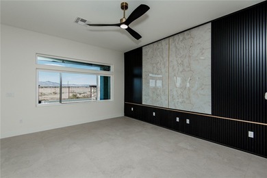 Experience modern luxury and energy-efficient living in this on Los Lagos Golf Club in Arizona - for sale on GolfHomes.com, golf home, golf lot