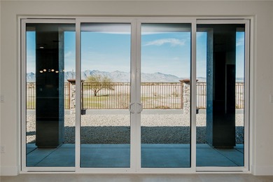 Experience modern luxury and energy-efficient living in this on Los Lagos Golf Club in Arizona - for sale on GolfHomes.com, golf home, golf lot