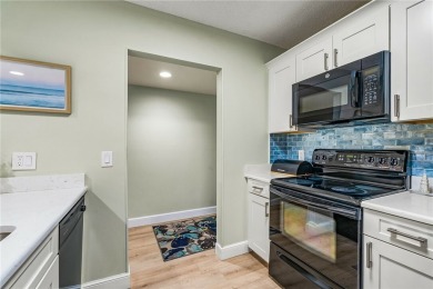 This condo has been totally updated new kitchen, new flooring on Vista Plantation Golf Club in Florida - for sale on GolfHomes.com, golf home, golf lot