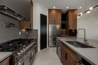 Experience modern luxury and energy-efficient living in this on Los Lagos Golf Club in Arizona - for sale on GolfHomes.com, golf home, golf lot