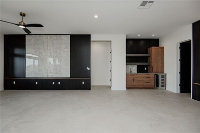 Experience modern luxury and energy-efficient living in this on Los Lagos Golf Club in Arizona - for sale on GolfHomes.com, golf home, golf lot