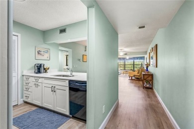 This condo has been totally updated new kitchen, new flooring on Vista Plantation Golf Club in Florida - for sale on GolfHomes.com, golf home, golf lot