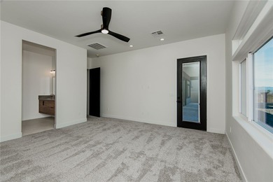 Experience modern luxury and energy-efficient living in this on Los Lagos Golf Club in Arizona - for sale on GolfHomes.com, golf home, golf lot