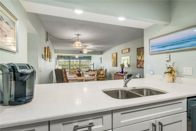 This condo has been totally updated new kitchen, new flooring on Vista Plantation Golf Club in Florida - for sale on GolfHomes.com, golf home, golf lot