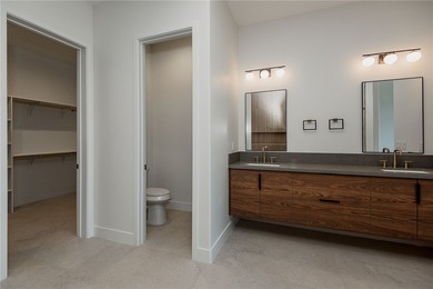 Experience modern luxury and energy-efficient living in this on Los Lagos Golf Club in Arizona - for sale on GolfHomes.com, golf home, golf lot