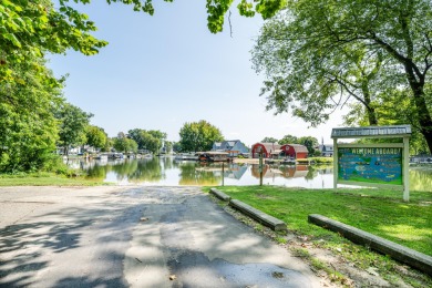 3 bdrm, 2 full bath, hardwood floors, new roof, furnace, A/C, on on Paw Paw Lake Golf Course in Michigan - for sale on GolfHomes.com, golf home, golf lot