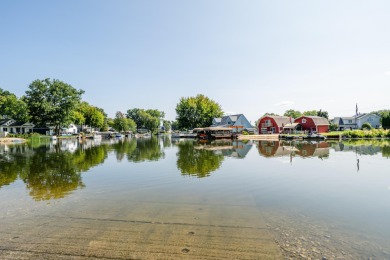 3 bdrm, 2 full bath, hardwood floors, new roof, furnace, A/C, on on Paw Paw Lake Golf Course in Michigan - for sale on GolfHomes.com, golf home, golf lot