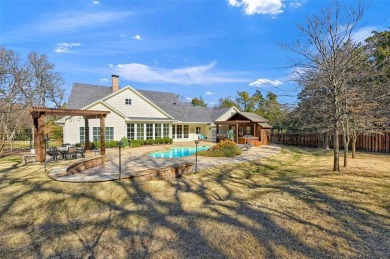 This stunning 4-bedroom, 3.5-bath home with guest suite and on Lake Kiowa Golf Course in Texas - for sale on GolfHomes.com, golf home, golf lot