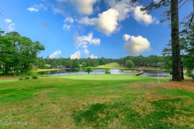 This unique brick home overlooking the 10th green of the award on Seven Lakes Country Club in North Carolina - for sale on GolfHomes.com, golf home, golf lot