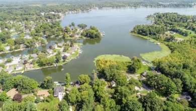 3 bdrm, 2 full bath, hardwood floors, new roof, furnace, A/C, on on Paw Paw Lake Golf Course in Michigan - for sale on GolfHomes.com, golf home, golf lot