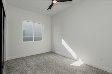 Experience modern luxury and energy-efficient living in this on Los Lagos Golf Club in Arizona - for sale on GolfHomes.com, golf home, golf lot