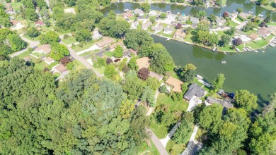 3 bdrm, 2 full bath, hardwood floors, new roof, furnace, A/C, on on Paw Paw Lake Golf Course in Michigan - for sale on GolfHomes.com, golf home, golf lot