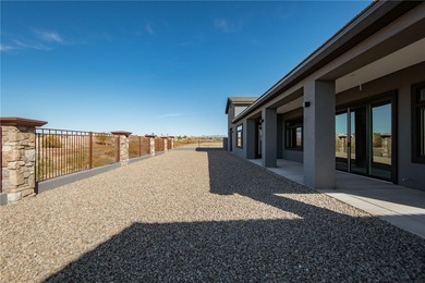 Experience modern luxury and energy-efficient living in this on Los Lagos Golf Club in Arizona - for sale on GolfHomes.com, golf home, golf lot