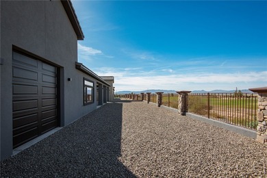 Experience modern luxury and energy-efficient living in this on Los Lagos Golf Club in Arizona - for sale on GolfHomes.com, golf home, golf lot