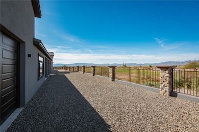 Experience modern luxury and energy-efficient living in this on Los Lagos Golf Club in Arizona - for sale on GolfHomes.com, golf home, golf lot