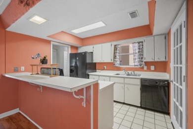 Savor the Florida lifestyle in this charming three-bedroom pool on Daytona Beach Golf Club in Florida - for sale on GolfHomes.com, golf home, golf lot