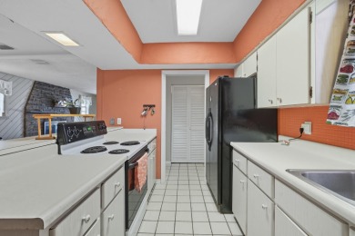 Savor the Florida lifestyle in this charming three-bedroom pool on Daytona Beach Golf Club in Florida - for sale on GolfHomes.com, golf home, golf lot