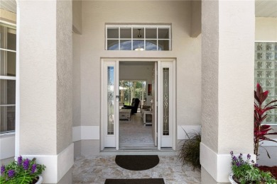 Welcome to your dream home nestled in the picturesque community on Twisted Oaks Golf Club in Florida - for sale on GolfHomes.com, golf home, golf lot