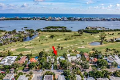 This luxurious 3 bedroom/2 bath home sits directly on famed Lake on Lake Worth Municipal Golf Course in Florida - for sale on GolfHomes.com, golf home, golf lot