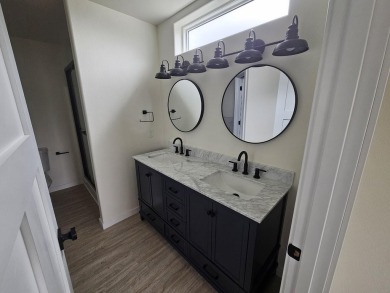 Brand new construction. Located in Hidden Bridge Ranch across on Hidden Bridge Golf Club in Wyoming - for sale on GolfHomes.com, golf home, golf lot