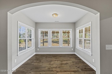 Beautifully maintained Wadsworth Mungo two-story home located in on Beau Rivage Golf and Resort in North Carolina - for sale on GolfHomes.com, golf home, golf lot