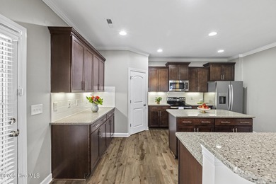 Beautifully maintained Wadsworth Mungo two-story home located in on Beau Rivage Golf and Resort in North Carolina - for sale on GolfHomes.com, golf home, golf lot