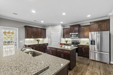 Beautifully maintained Wadsworth Mungo two-story home located in on Beau Rivage Golf and Resort in North Carolina - for sale on GolfHomes.com, golf home, golf lot