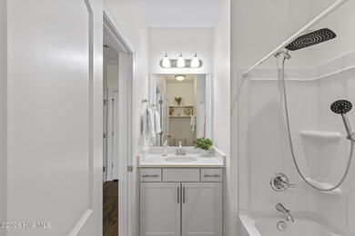 Beautifully maintained Wadsworth Mungo two-story home located in on Beau Rivage Golf and Resort in North Carolina - for sale on GolfHomes.com, golf home, golf lot