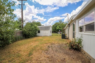This beautifully fully remodeled 4-bedroom, 2-bathroom home is on Prairie Lakes Golf Club in Texas - for sale on GolfHomes.com, golf home, golf lot
