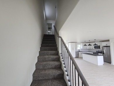 Brand new construction. Located in Hidden Bridge Ranch across on Hidden Bridge Golf Club in Wyoming - for sale on GolfHomes.com, golf home, golf lot