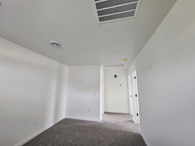 Brand new construction. Located in Hidden Bridge Ranch across on Hidden Bridge Golf Club in Wyoming - for sale on GolfHomes.com, golf home, golf lot
