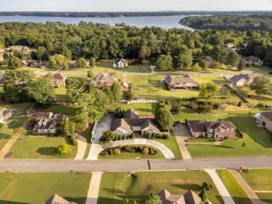 Welcome to your dream home! This beautiful 4 bedroom, 3 bathroom on Turtle Point Yacht and Country Club in Alabama - for sale on GolfHomes.com, golf home, golf lot