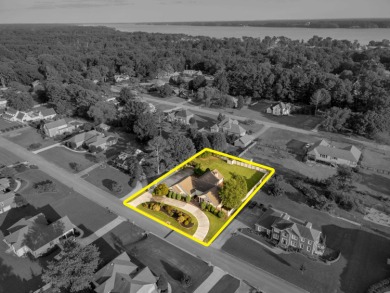 Welcome to your dream home! This beautiful 4 bedroom, 3 bathroom on Turtle Point Yacht and Country Club in Alabama - for sale on GolfHomes.com, golf home, golf lot