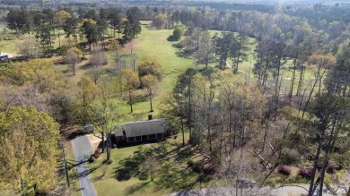 Nestled in a prime location, this stunning four-bedroom on Choctaw Country Club in Alabama - for sale on GolfHomes.com, golf home, golf lot