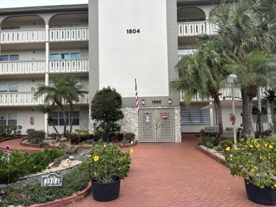 Wow, what a view! This 2-bedroom, 2-bath deluxe ground-floor on Wynmoor Golf Course in Florida - for sale on GolfHomes.com, golf home, golf lot