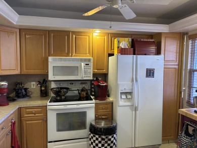 Wow, what a view! This 2-bedroom, 2-bath deluxe ground-floor on Wynmoor Golf Course in Florida - for sale on GolfHomes.com, golf home, golf lot