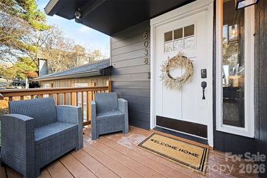 This 1.5-story traditional home is located in the highly on Tega Cay Golf Club in South Carolina - for sale on GolfHomes.com, golf home, golf lot